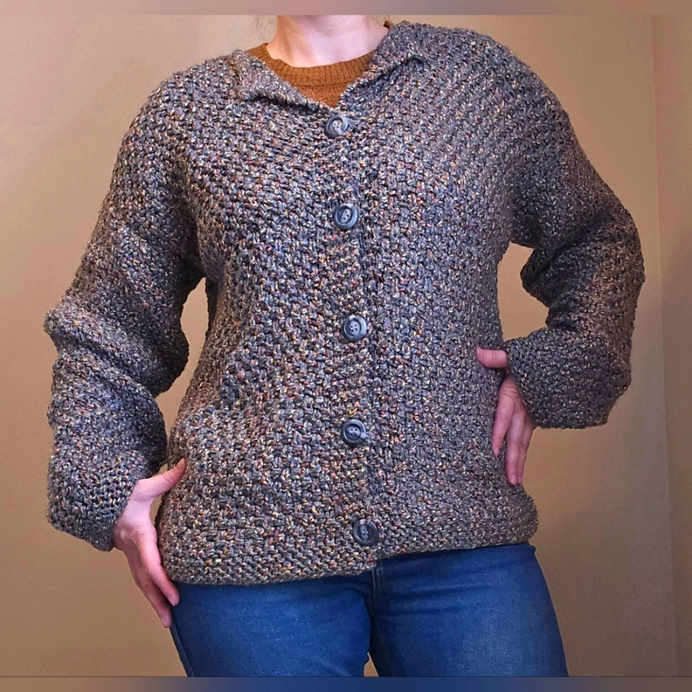 Hand Knit cardigan.  Long sleeves. 5 large buttons. Size medium/ large